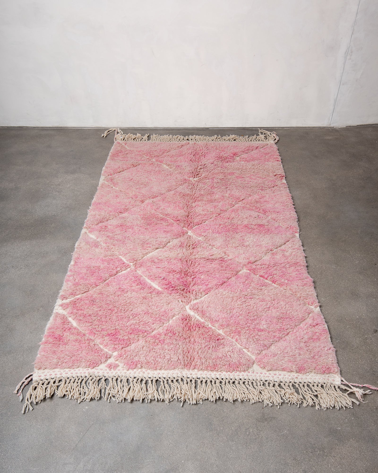 Modern, designer, handcrafted Berber rug from Morocco. Beniourain carpet with beautiful colours and patterns and fluffy wool texture.